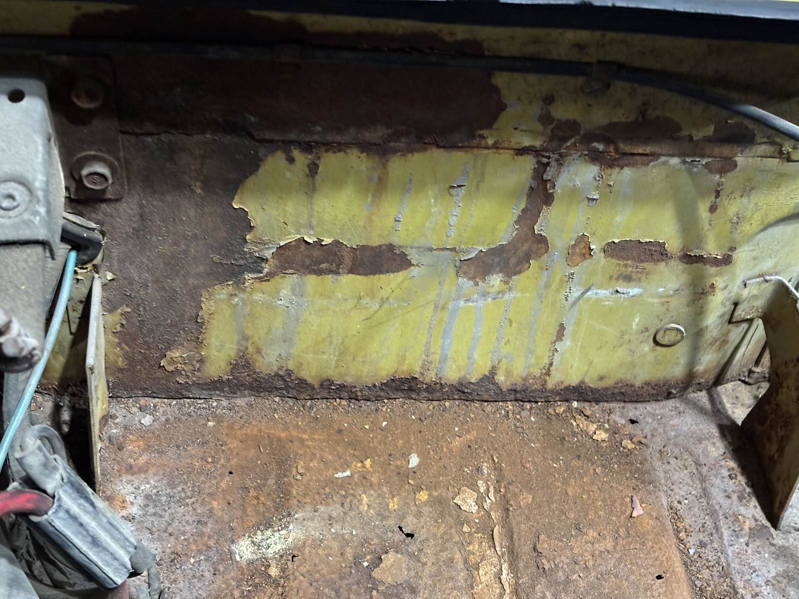 1974 Triumph TR6 battery compartment.