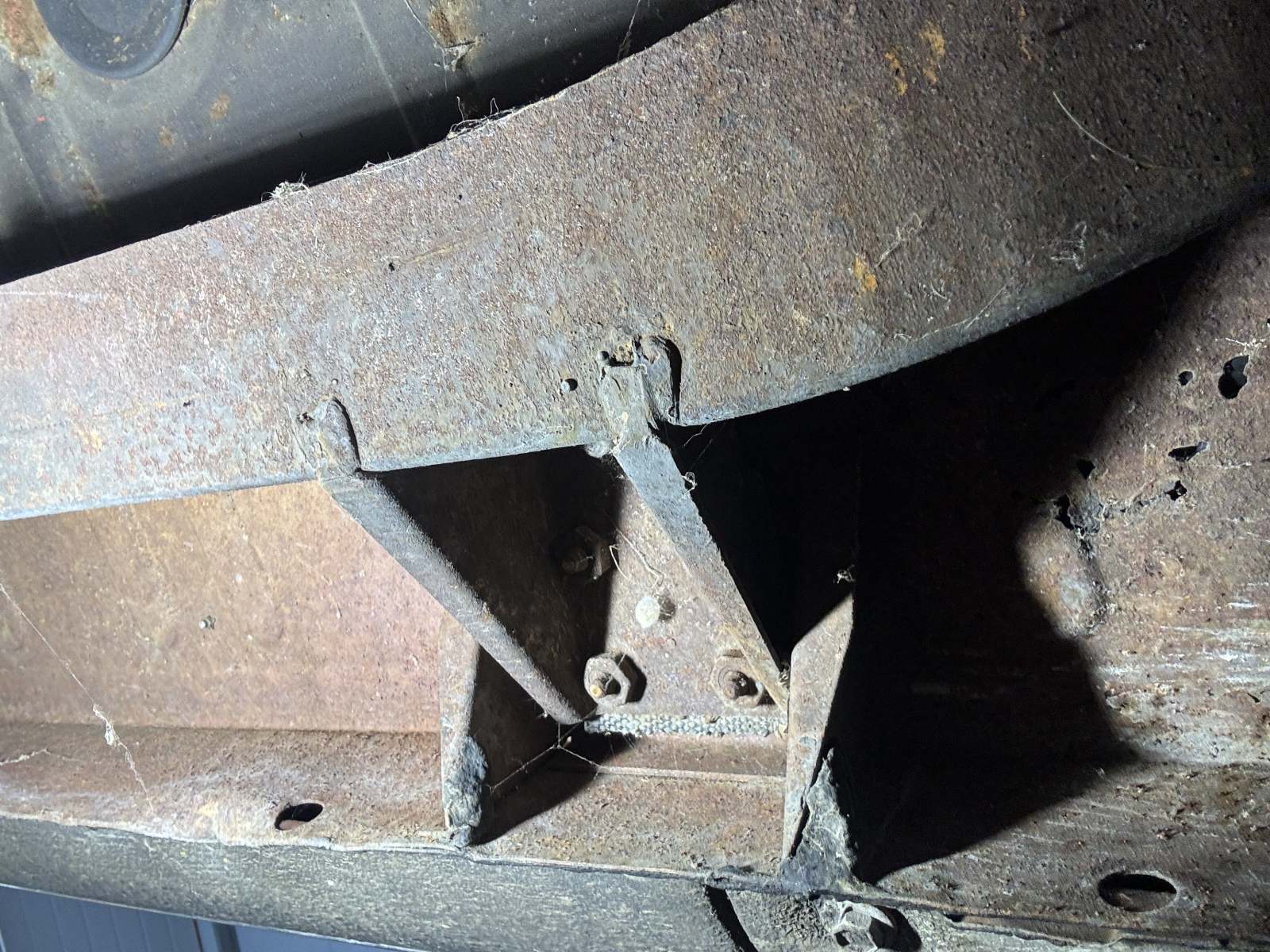 1974 Triumph TR6 rocker panel area.