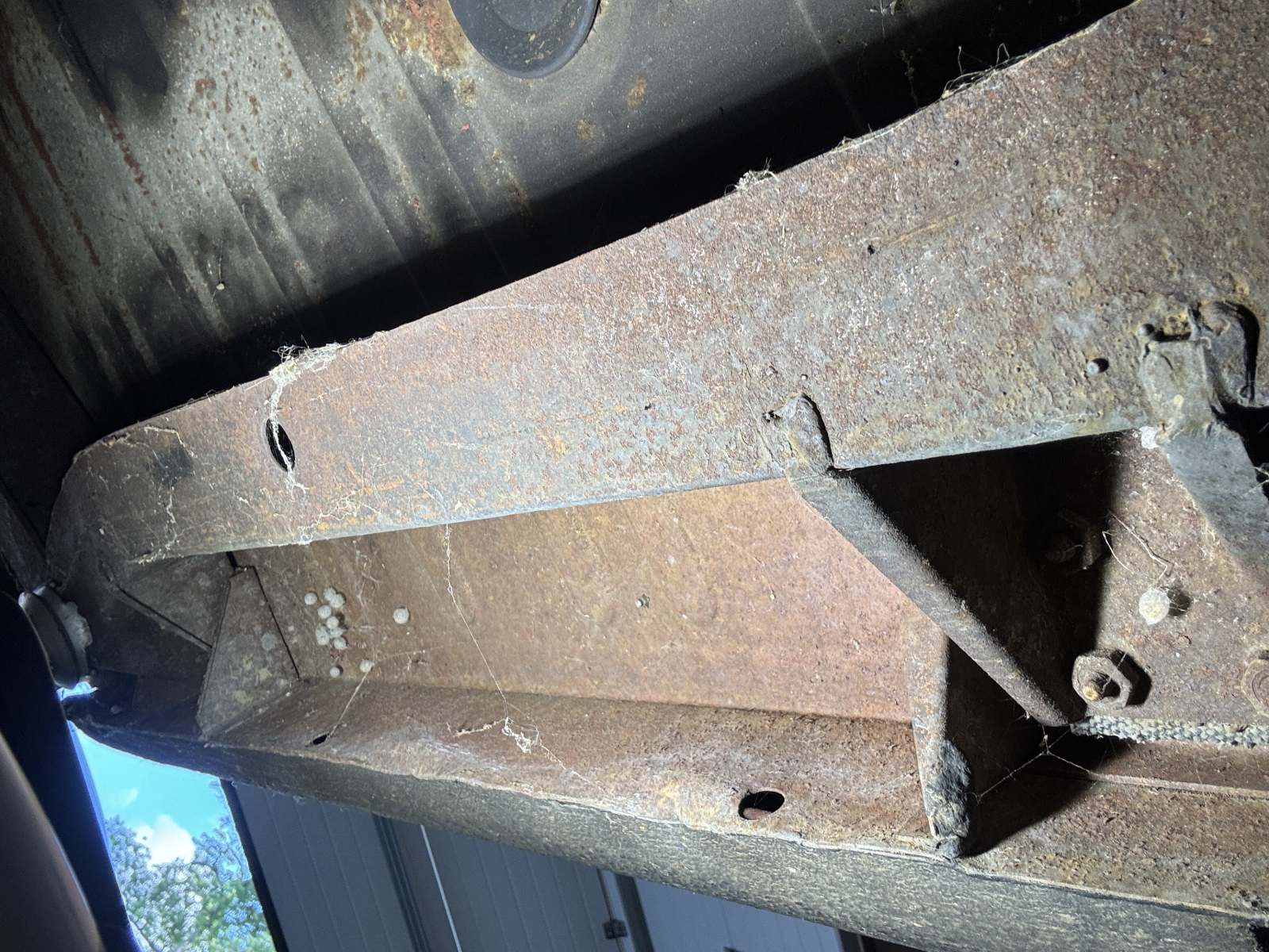 1974 Triumph TR6 rocker panel area.